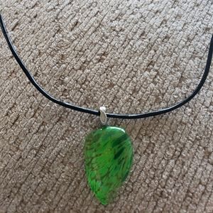 Fused glass pendant in bright green.